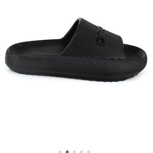 Bebe black slides